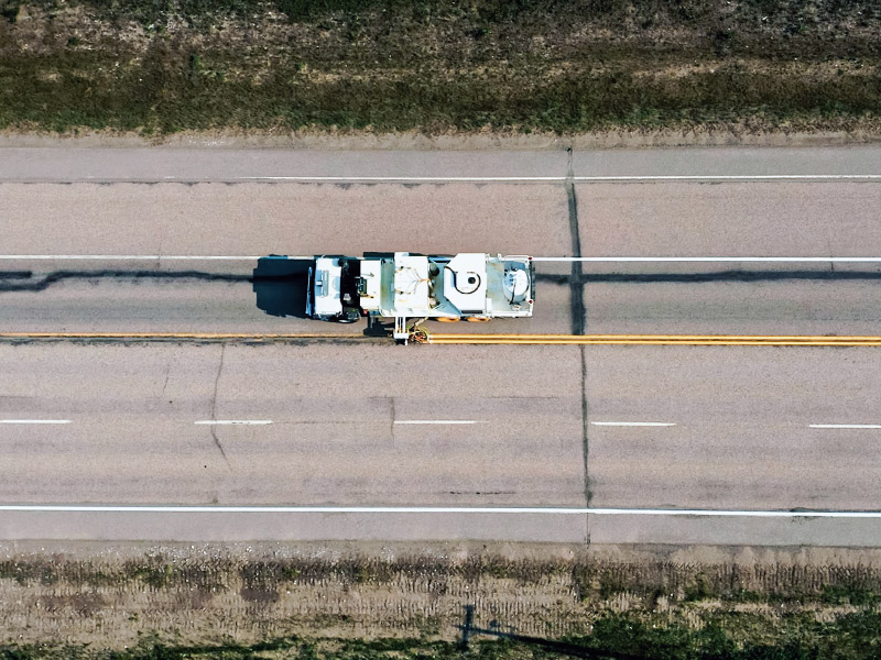 Line painting along a highway